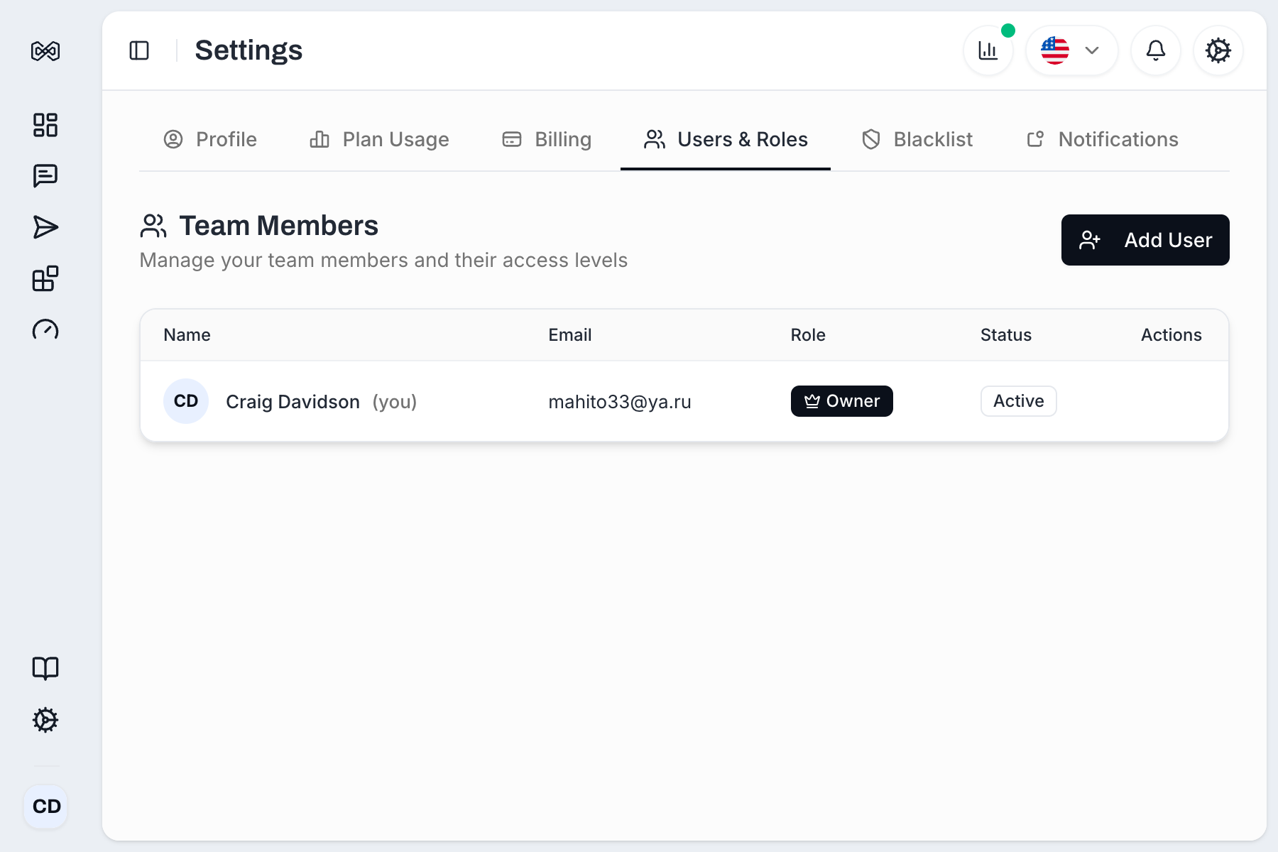 Users & Roles tab showing team members table with Add User button